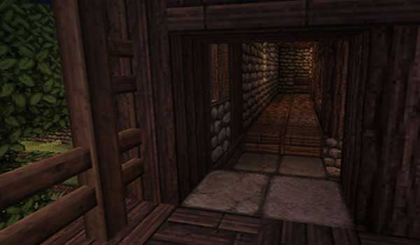 image of the entrance to a cave, decorated with the JohnSmith texture pack 1.12, 1.10 and 1.9.