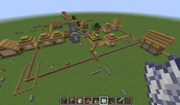 Image where we can see a village surrounded by the defensive walls that will generate the villagers after installing the Regrowth Mod.