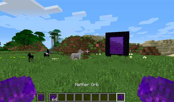 Image where we can see a player holding two orbs, in this case those of the Nether, from The Basic Elements Mod.