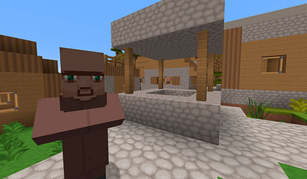 Image where we can see how a villager looks like, next to the well of a village, using the MetalTxus Uncertainty package textures.