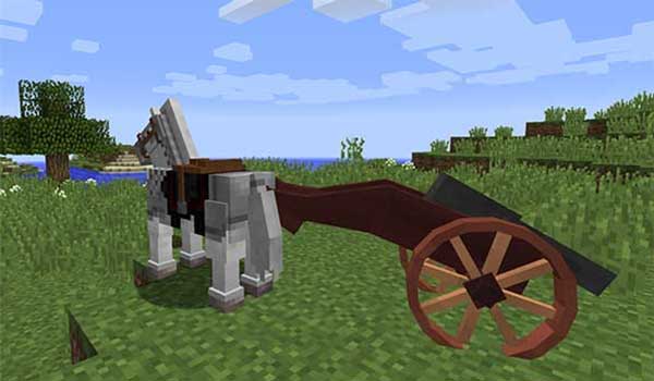 Image where we can see a horse dragging one of the cannons that we can make with the Old Guns mod.